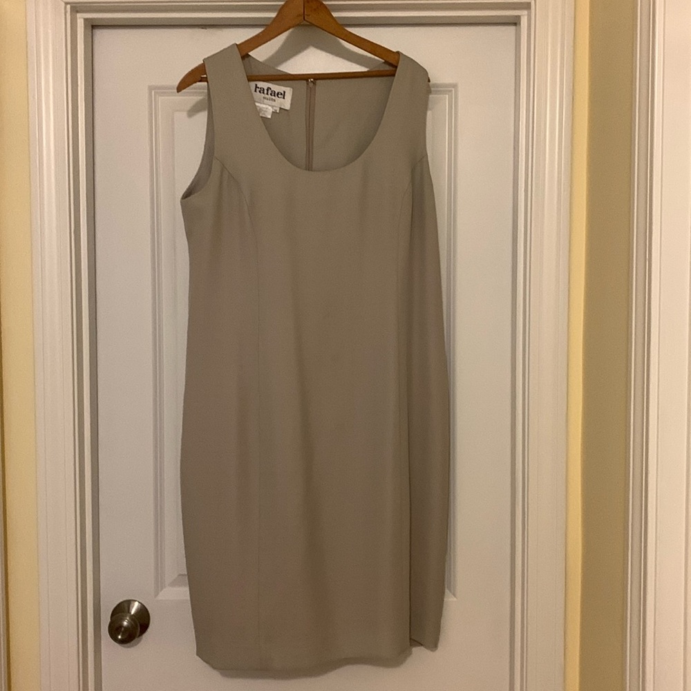 Ladies zip /small slit in back.sleeveless